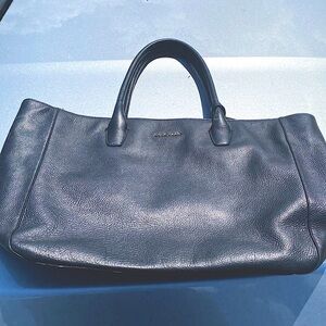 Used Cole Haan Purse with barely used interior